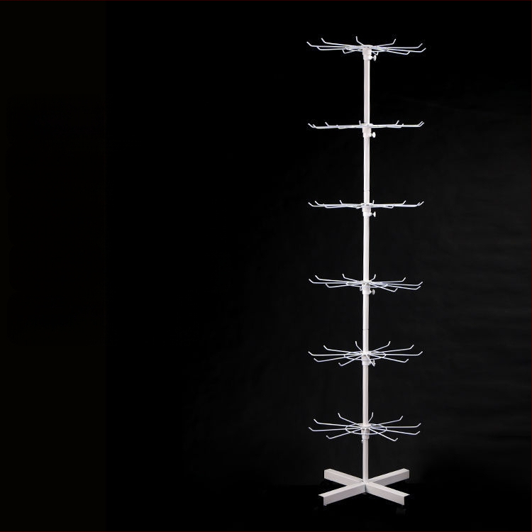 Daugiasluoksnė gatvės prekystalio besisukanti lentynėlė, karoliai, automobiliams pakabinami karoliukai, virvelės, kojinės, skrybėlių papuošalų lentynėlė, parduotuvės durų pakabinamas stovas, vitrina 1