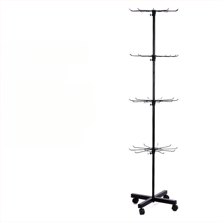 Daugiasluoksnė gatvės prekystalio besisukanti lentynėlė, karoliai, automobiliams pakabinami karoliukai, virvelės, kojinės, skrybėlių papuošalų lentynėlė, parduotuvės durų pakabinamas stovas, vitrina 1