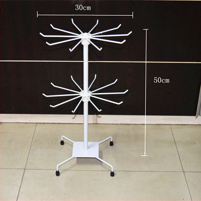 Daugiasluoksnė gatvės prekystalio besisukanti lentynėlė, karoliai, automobiliams pakabinami karoliukai, virvelės, kojinės, skrybėlių papuošalų lentynėlė, parduotuvės durų pakabinamas stovas, vitrina 1