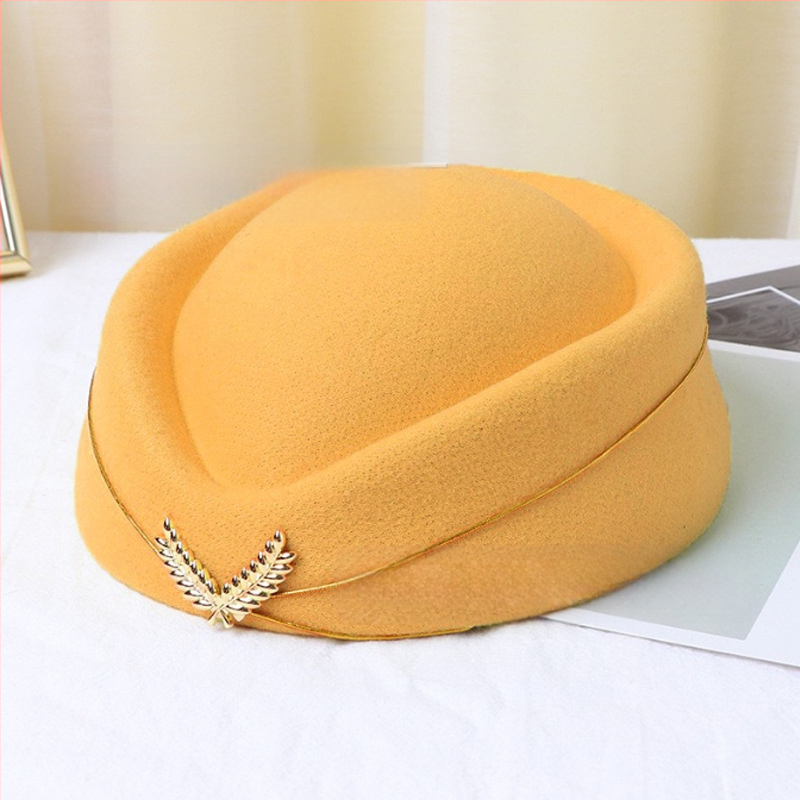 Stjuardessi müts, daamide barett, vastuvõtu etiketi müts, väike trummiorkester, Briti lavaesinemise müts