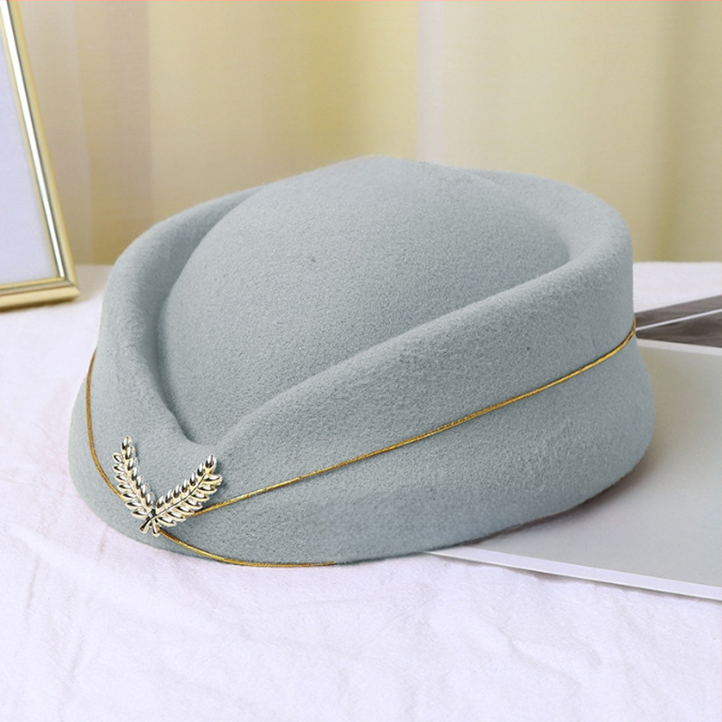 Stjuardessi müts, daamide barett, vastuvõtu etiketi müts, väike trummiorkester, Briti lavaesinemise müts