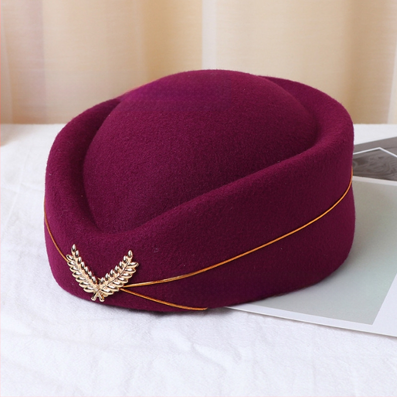 Stjuardessi müts, daamide barett, vastuvõtu etiketi müts, väike trummiorkester, Briti lavaesinemise müts