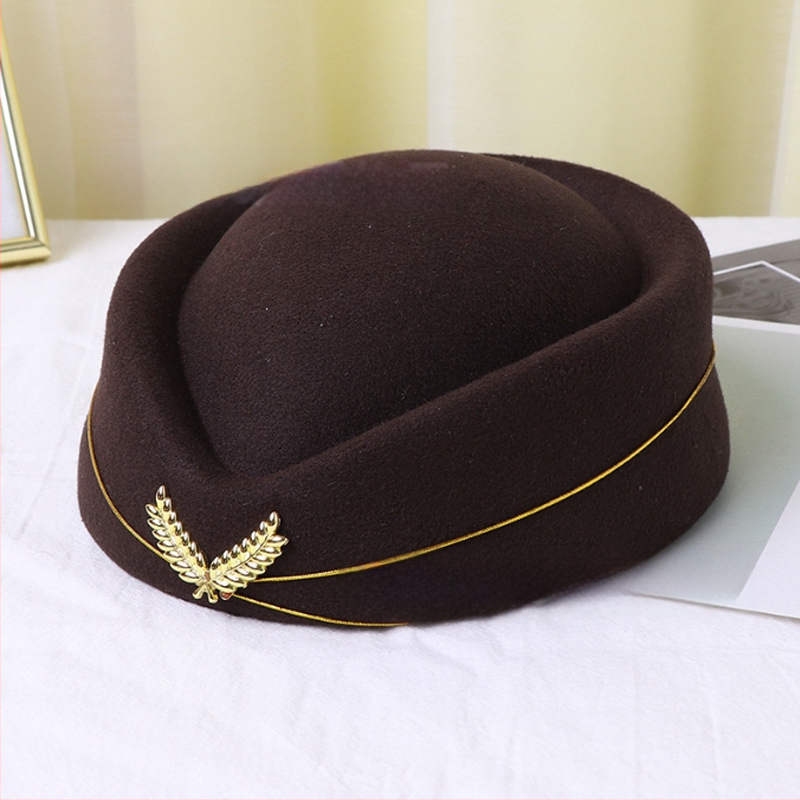 Stjuardessi müts, daamide barett, vastuvõtu etiketi müts, väike trummiorkester, Briti lavaesinemise müts