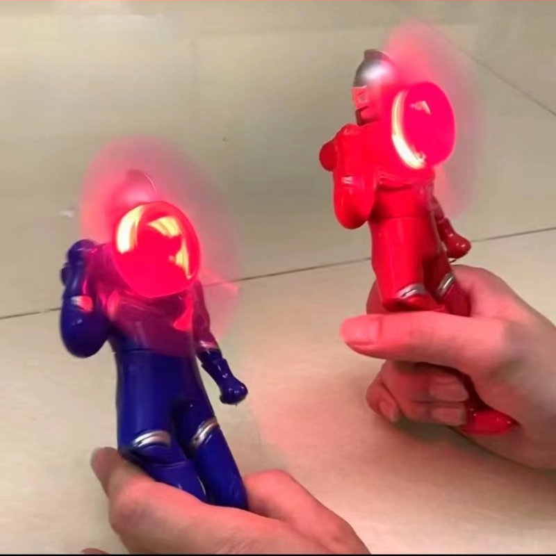 Mini „Ultraman“ šviečiantis ventiliatorius, rankomis sukamas elektrinis ventiliatorius, mažas rankinis, rankomis presuotas „Superman“ patogus rankinis ventiliatorius
