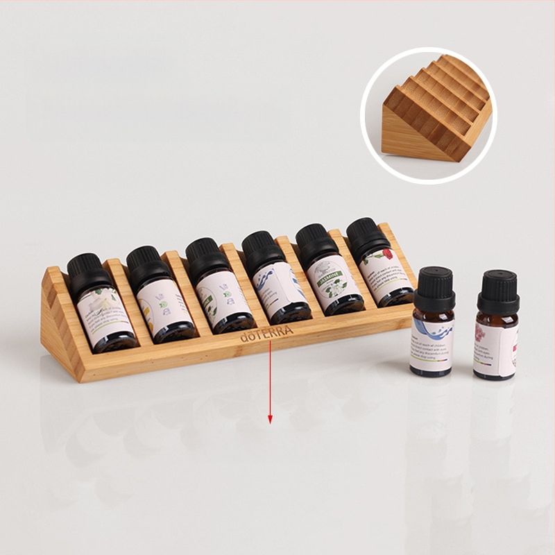 Allika eeterlike õlide riiul lauaarvutile Mini kolmnurkne eeterlike õlide pudelite hoiustamise ja viimistlusega alus bambusest ja puidust eeterlike õlide pudelite huulepulga vitriin