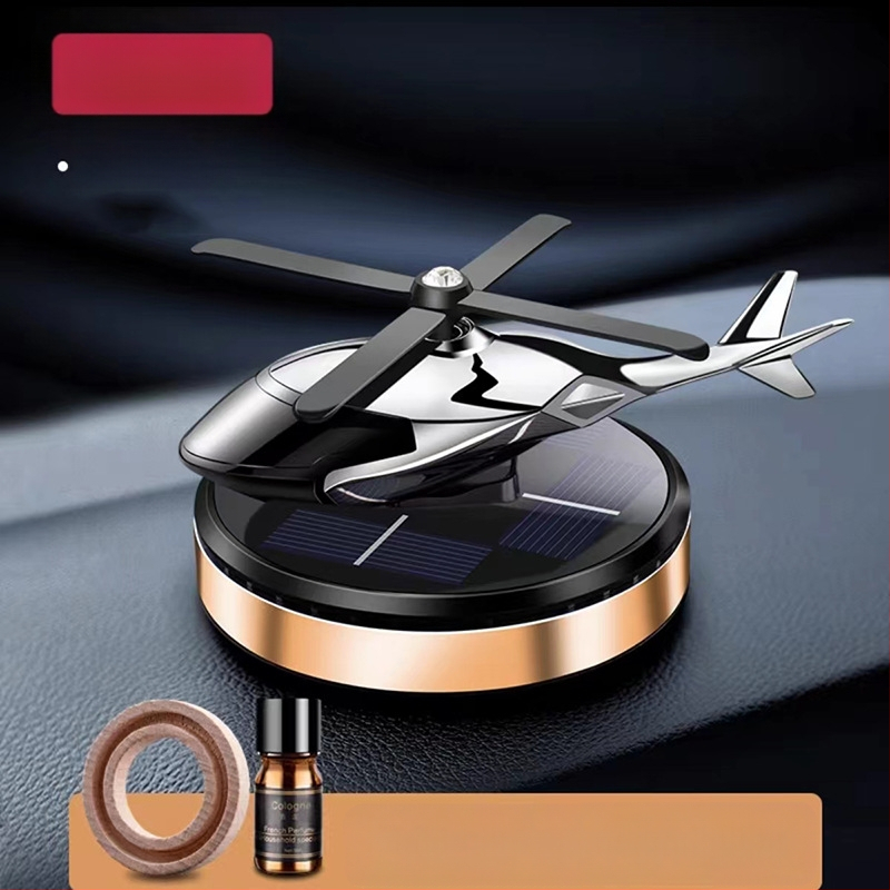 Päikeseenergial töötav pöörlev helikopteri autokaunistus loominguline aroomiteraapia armatuurlaud piiriülene meeste autotarvikute lõhnahoidja