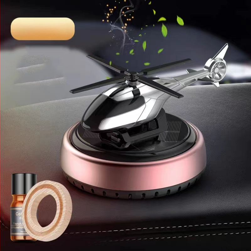 Päikeseenergial töötav pöörlev helikopteri autokaunistus loominguline aroomiteraapia armatuurlaud piiriülene meeste autotarvikute lõhnahoidja