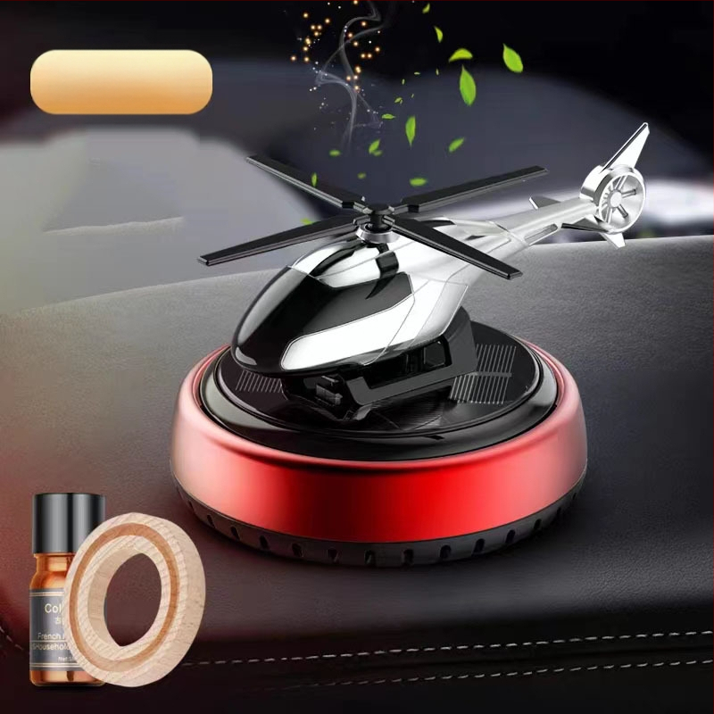 Päikeseenergial töötav pöörlev helikopteri autokaunistus loominguline aroomiteraapia armatuurlaud piiriülene meeste autotarvikute lõhnahoidja