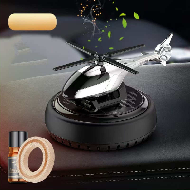 Päikeseenergial töötav pöörlev helikopteri autokaunistus loominguline aroomiteraapia armatuurlaud piiriülene meeste autotarvikute lõhnahoidja