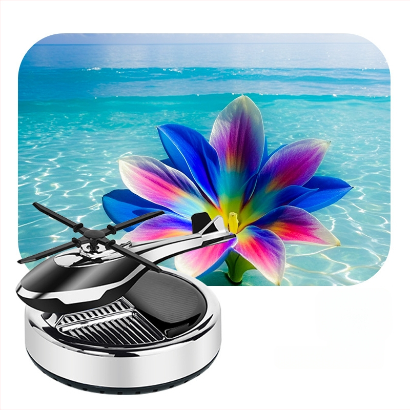 Päikeseenergial töötav pöörlev helikopteri autokaunistus loominguline aroomiteraapia armatuurlaud piiriülene meeste autotarvikute lõhnahoidja