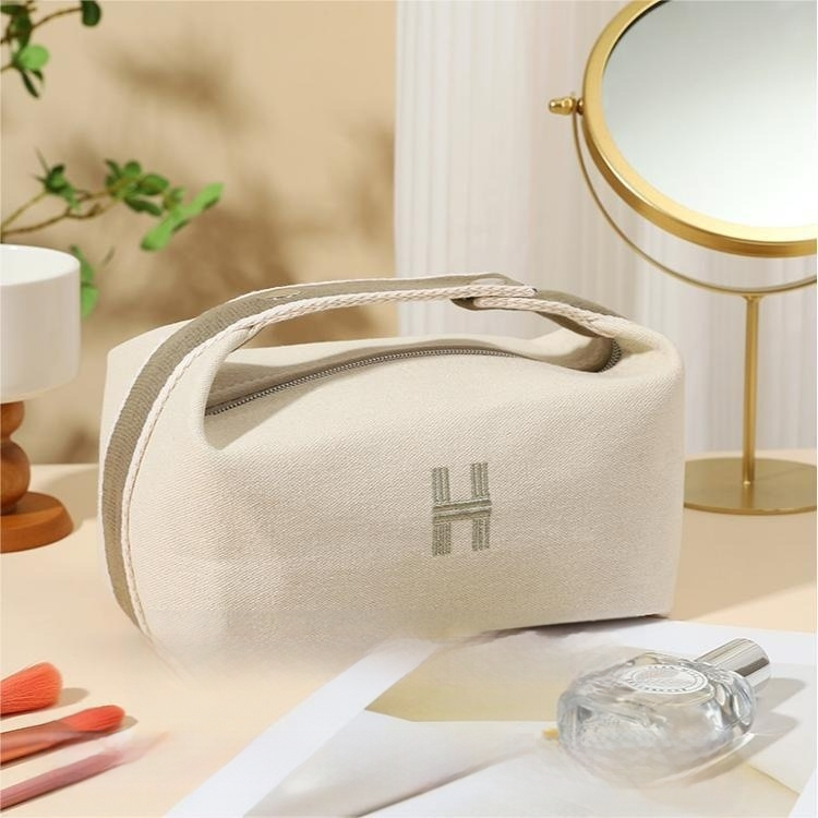 Kohandatud logoga lõuendikosmeetikakott, moodne õlakott, uhke ja suure mahutavusega reisitarvete kott