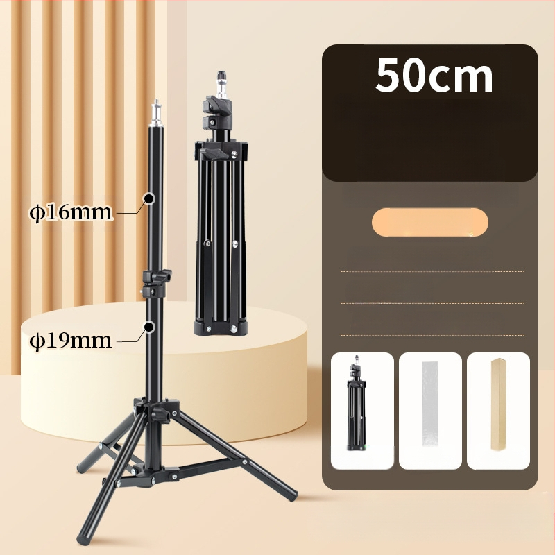 Στήριγμα Φωτογραφίας για Ζωντανή Μετάδοση – Επιδαπέδιο Τρίποδας με Ενισχυμένο Φωτιστικό Στήριγμα; Υλικό: Σιδερένιος σωλήνας + ABS; Φορτίο: 2–5 kg; Ύψος: 68–210 cm; Διαμέτρων σωλήνων: 22/19/16 mm; 3 τμήματα