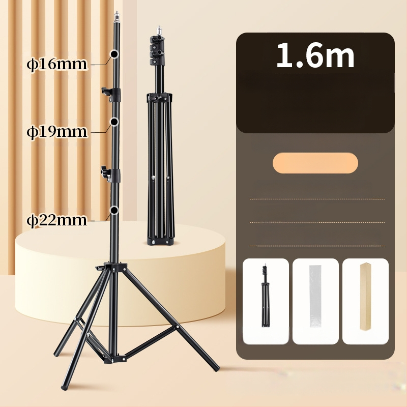 Στήριγμα Φωτογραφίας για Ζωντανή Μετάδοση – Επιδαπέδιο Τρίποδας με Ενισχυμένο Φωτιστικό Στήριγμα; Υλικό: Σιδερένιος σωλήνας + ABS; Φορτίο: 2–5 kg; Ύψος: 68–210 cm; Διαμέτρων σωλήνων: 22/19/16 mm; 3 τμήματα