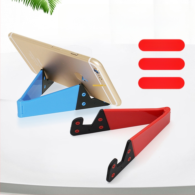 V-veida galda statīvs telefoniem un planšetēm, no plastmasas, universāls, ar personalizācijas atbalstu