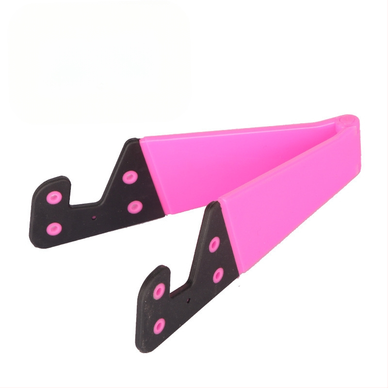 V-veida galda statīvs telefoniem un planšetēm, no plastmasas, universāls, ar personalizācijas atbalstu