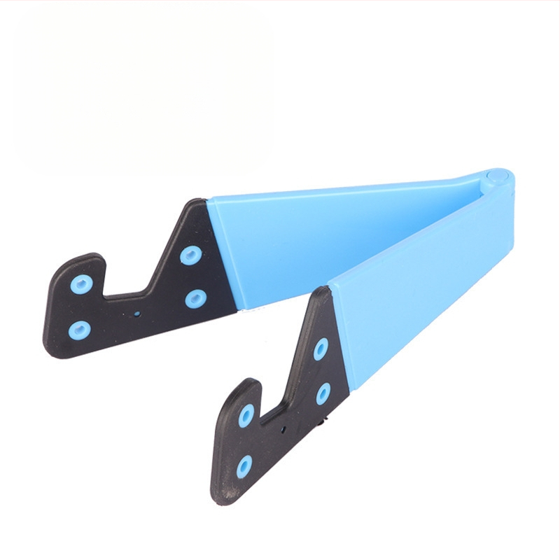 V-veida galda statīvs telefoniem un planšetēm, no plastmasas, universāls, ar personalizācijas atbalstu