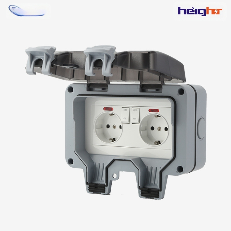 Lauko atsparus vandeniui Schuko dvigubas lizdas su jungikliu ir indikatoriaus lempute (ES standartas)
