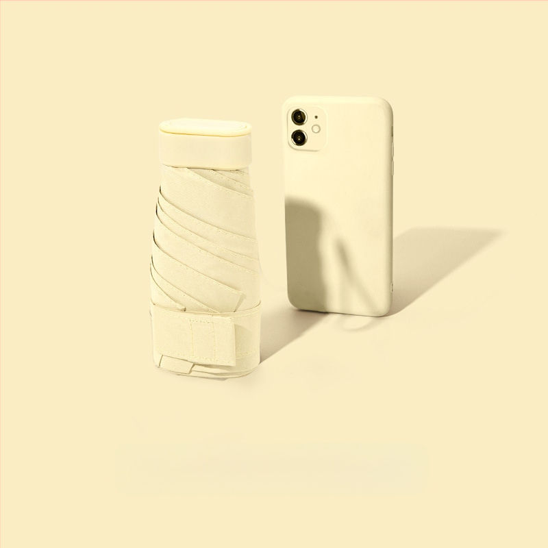 Kapsulinio tipo skėtis moterims, 6 rėmų, 210T audinys, UPF >40, rankinis atidarymas‑uždarymas, svoris 220 g