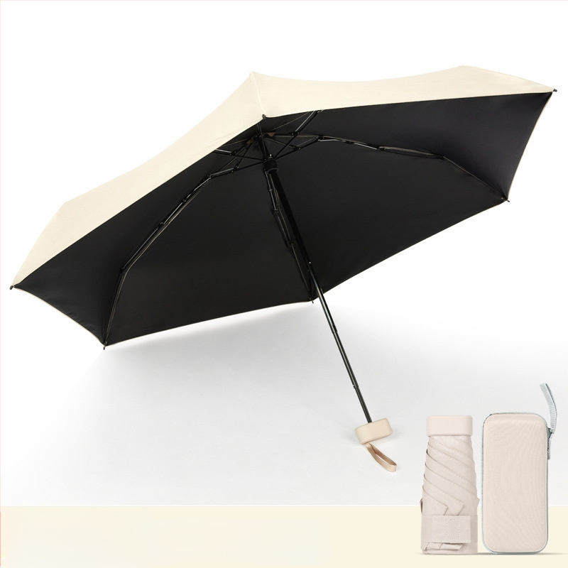 Kapsulinio tipo skėtis moterims, 6 rėmų, 210T audinys, UPF >40, rankinis atidarymas‑uždarymas, svoris 220 g