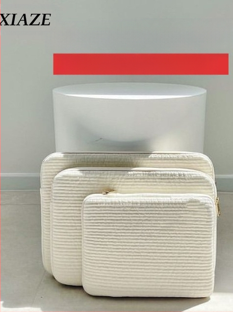 Vidinė apsauginė dėklas nešiojamam kompiuteriui ir planšetiniam – itin lengvas, atsparus dėvėjimuisi ir išplečiama; drobė su poliesterio įdaila.