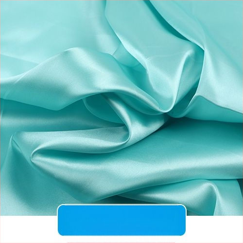 Šilkinis satino audinys – drabužių pamušalui, scenos užuolaidoms ir vestuvinei dekoracijai