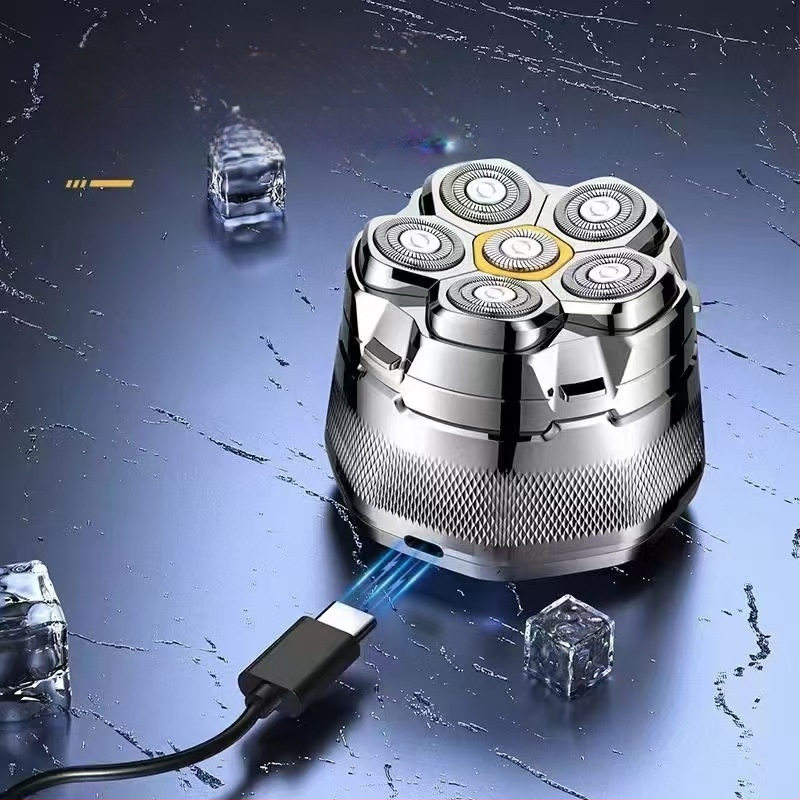 Elektrinis skutimosi prietaisas su šešių galvų rotacine galva, platus plovimas visam kūnui, LED ekranas, plūduriuojanti pjovimo galva, nuimamos ir plaunamos galvutės, įmontuota Li-ion baterija 800–1000 mAh, veikimo laikas daugiau nei 60 min.