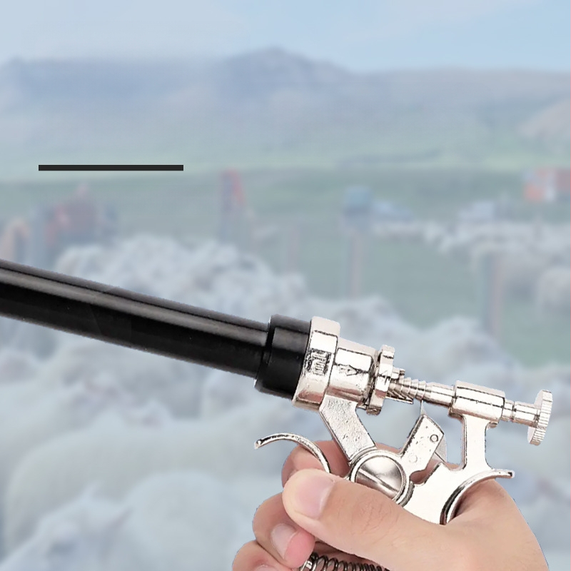 Veterinarinis nerūdijančio plieno ilgojo rankos nuolatinis injektorius, reguliuojamas vakcinacijos injektorius kiaulėms, galvijams ir avims — tinkamas galvijų auginimui ir akvakultūrai; veikia įprastą temperatūrą; kokybės užtikrinimas