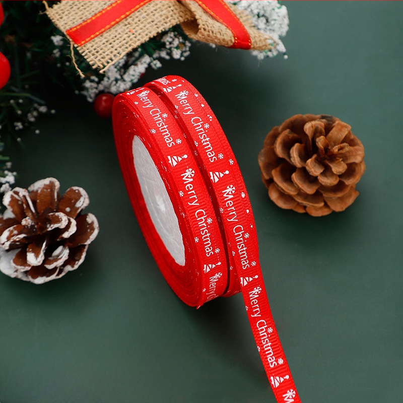 1 cm pločio Kalėdų eglutės motyvo kaspinas su siūlų spauda, raudona ir žalia, skirtas dovanų įvyniojimui