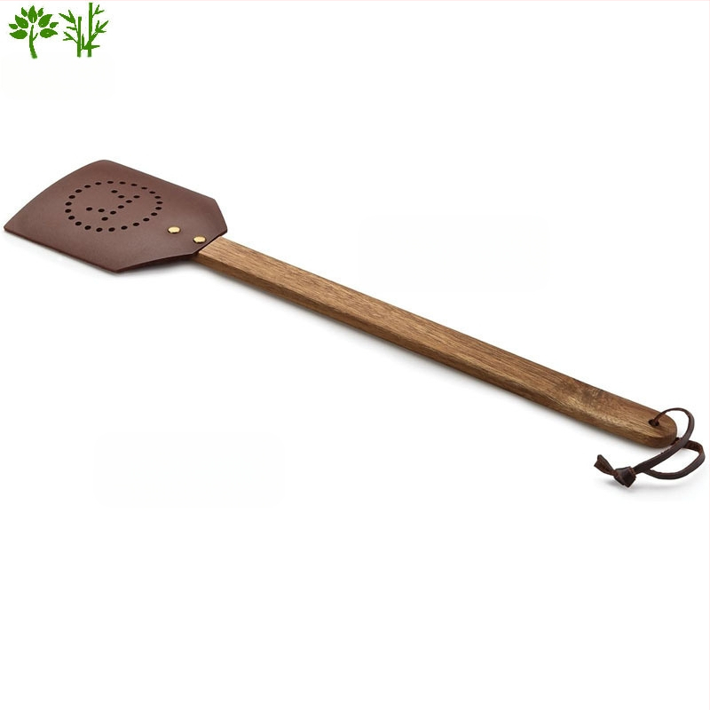 Odinė musėms plaktuvė su ilga bukmedžio rankena — tvirta konstrukcija, netoksiška, personalizavimo galimybė