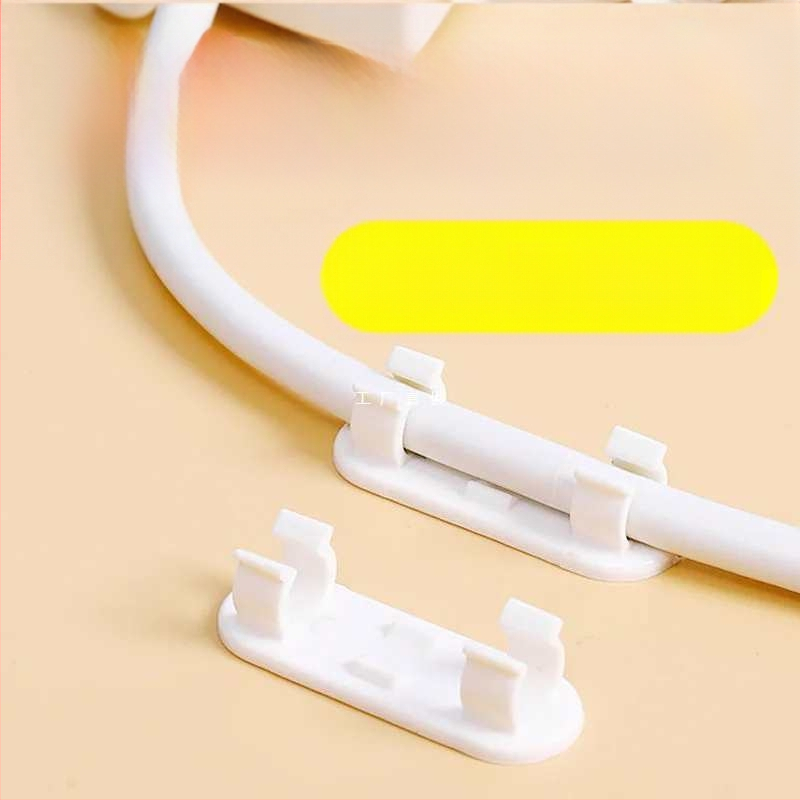 Kábelrendező klip, fúrás nélkül, öntapadós, falra szerelhető (Anyag: műanyag; Stílus: egyéb; Importált: Nem; Kategória: Egyéb rendező és porvédelmi felszerelés)