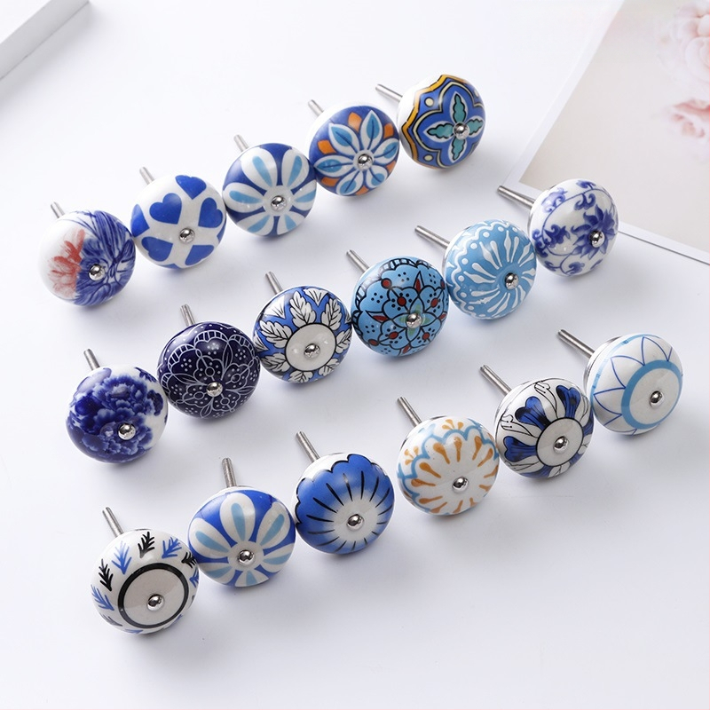 Yunchang στρογγυλή κεραμική λαβή για ντουλάπες και συρτάρια — μοντέρνος μινιμαλιστικός στυλ, ελαφρύς πολυτελής χαρακτήρας; υλικό κεραμικό; επίστρωση ηλεκτροπλατίωσης; μάρκα Yunchang Hardware.