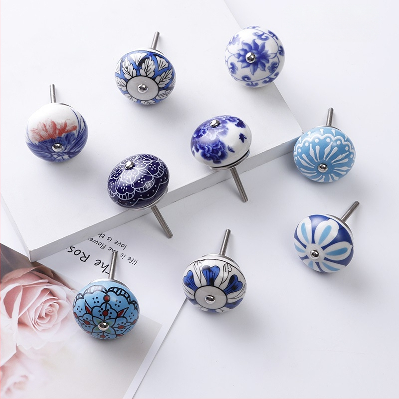 Yunchang στρογγυλή κεραμική λαβή για ντουλάπες και συρτάρια — μοντέρνος μινιμαλιστικός στυλ, ελαφρύς πολυτελής χαρακτήρας; υλικό κεραμικό; επίστρωση ηλεκτροπλατίωσης; μάρκα Yunchang Hardware.