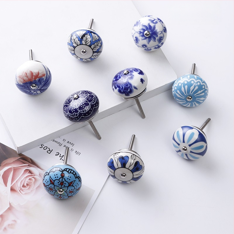 Yunchang στρογγυλή κεραμική λαβή για ντουλάπες και συρτάρια — μοντέρνος μινιμαλιστικός στυλ, ελαφρύς πολυτελής χαρακτήρας; υλικό κεραμικό; επίστρωση ηλεκτροπλατίωσης; μάρκα Yunchang Hardware.