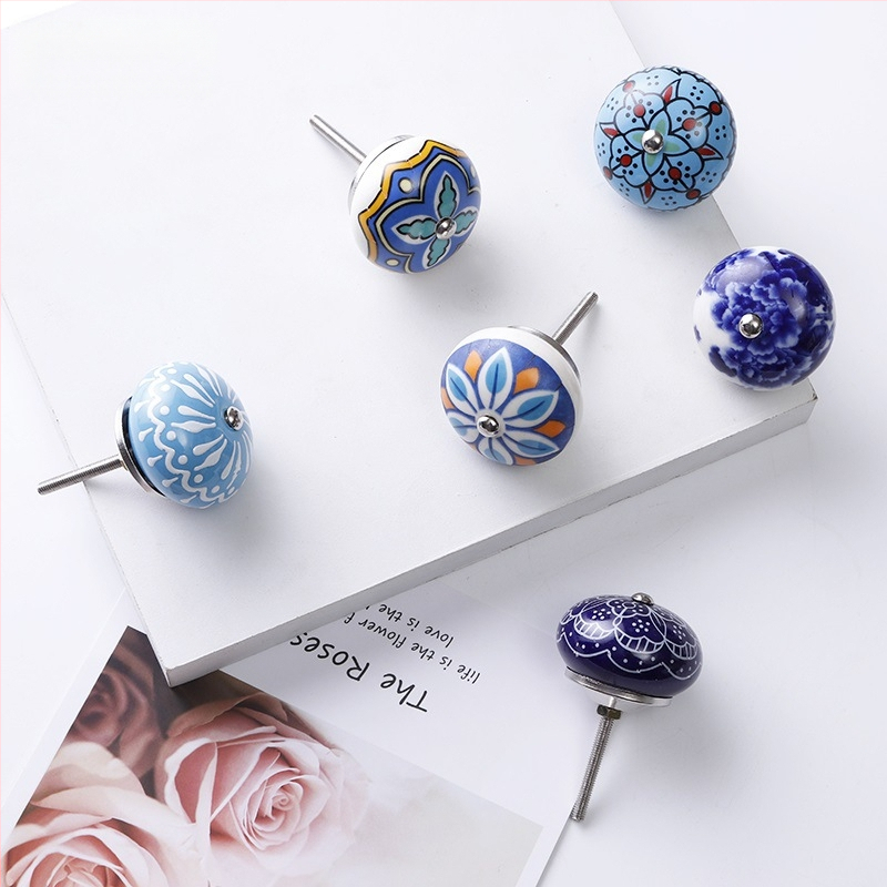 Yunchang στρογγυλή κεραμική λαβή για ντουλάπες και συρτάρια — μοντέρνος μινιμαλιστικός στυλ, ελαφρύς πολυτελής χαρακτήρας; υλικό κεραμικό; επίστρωση ηλεκτροπλατίωσης; μάρκα Yunchang Hardware.