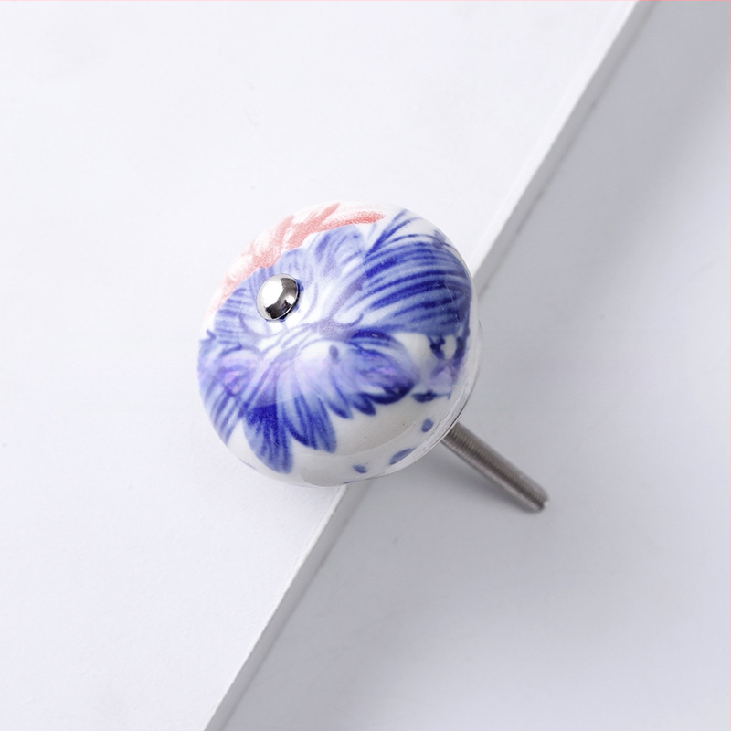 Yunchang στρογγυλή κεραμική λαβή για ντουλάπες και συρτάρια — μοντέρνος μινιμαλιστικός στυλ, ελαφρύς πολυτελής χαρακτήρας; υλικό κεραμικό; επίστρωση ηλεκτροπλατίωσης; μάρκα Yunchang Hardware.