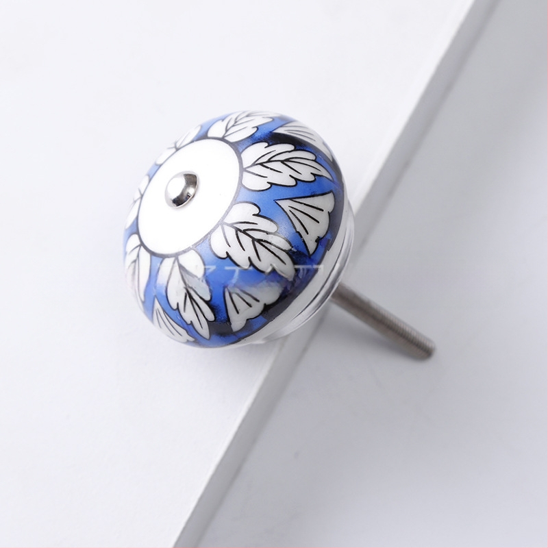 Yunchang στρογγυλή κεραμική λαβή για ντουλάπες και συρτάρια — μοντέρνος μινιμαλιστικός στυλ, ελαφρύς πολυτελής χαρακτήρας; υλικό κεραμικό; επίστρωση ηλεκτροπλατίωσης; μάρκα Yunchang Hardware.