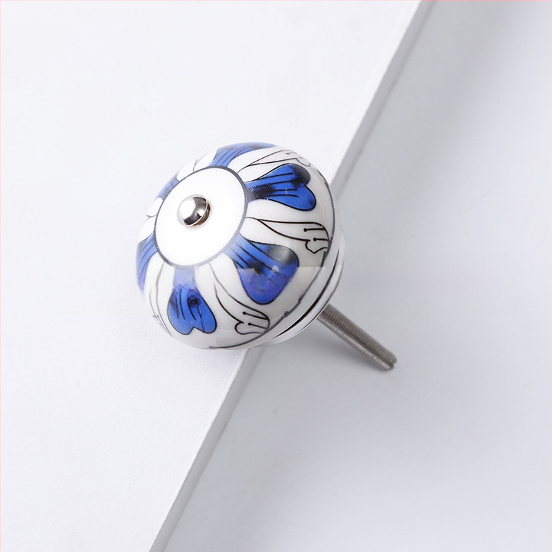 Yunchang στρογγυλή κεραμική λαβή για ντουλάπες και συρτάρια — μοντέρνος μινιμαλιστικός στυλ, ελαφρύς πολυτελής χαρακτήρας; υλικό κεραμικό; επίστρωση ηλεκτροπλατίωσης; μάρκα Yunchang Hardware.