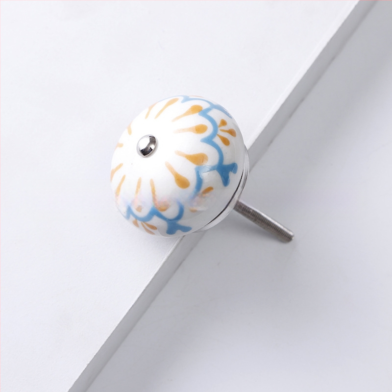 Yunchang στρογγυλή κεραμική λαβή για ντουλάπες και συρτάρια — μοντέρνος μινιμαλιστικός στυλ, ελαφρύς πολυτελής χαρακτήρας; υλικό κεραμικό; επίστρωση ηλεκτροπλατίωσης; μάρκα Yunchang Hardware.