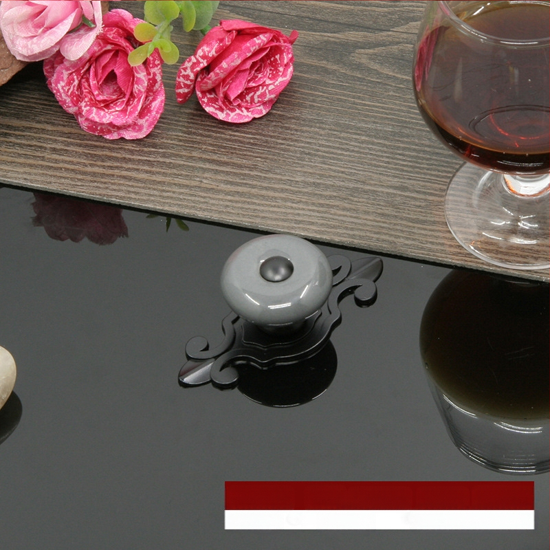 Apvali keramikinė spintos durų ir stalčiaus rankenėlė su baze, šiuolaikinis minimalistinis stilius.