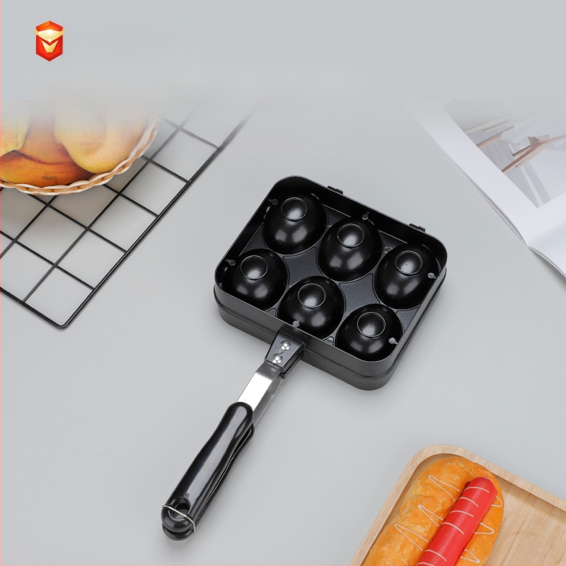 Šypsenosios veido kiaušinių vaflių keptuvė – nelimpančio, iš aliuminio lydinio, suderinama su dujinėmis viryklėmis, su atspausdintu logotipu