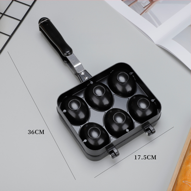 Šypsenosios veido kiaušinių vaflių keptuvė – nelimpančio, iš aliuminio lydinio, suderinama su dujinėmis viryklėmis, su atspausdintu logotipu