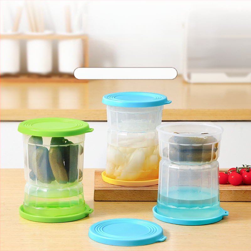 Separuotos marinuotų produktų indas su sausos ir drėgnos atskyrimo sistema šaldytuve — apvalios formos, medžiaga PP silikonas, talpa 1–2 L