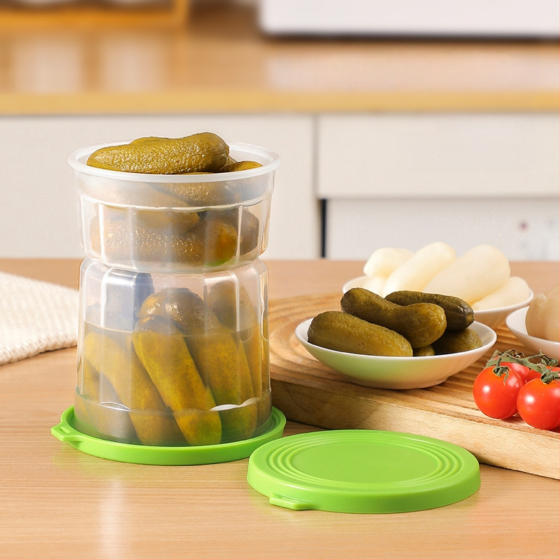 Separuotos marinuotų produktų indas su sausos ir drėgnos atskyrimo sistema šaldytuve — apvalios formos, medžiaga PP silikonas, talpa 1–2 L