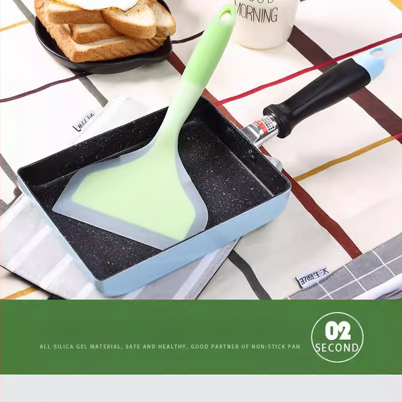 Silikoninis kepimo šaukštas - nelipnus, atsparus aukštoms temperatūroms, neslidus, apsauga nuo nudegimų, rankena iš silikono su plastiko įvyniojimu; pritaikoma