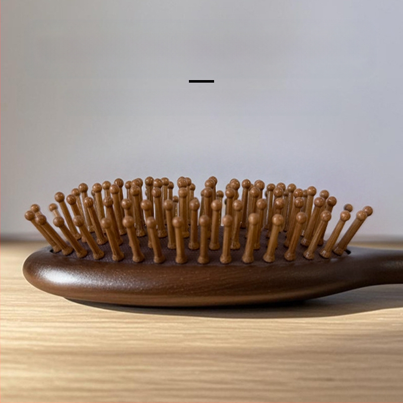 Ovāla santalova koka masāžas ķemme ar fēniksa gravējumu galvas ādas meridiāniem, Yixuan zīmols, izcelsme Džinhua