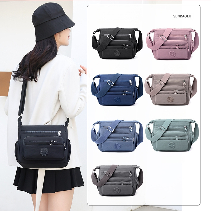 Дамска чанта през рамо с голям обем, изработена от найлон, цип за затваряне, подплата полиестер, множество вътрешни джобове