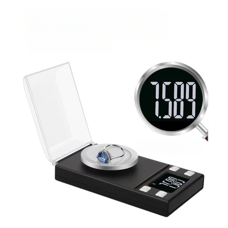 Mažas elektroninės juvelyrinių papuošalų svarstyklės, aukšta tikslumas 0.001 g, modelis 118; svėrimo diapazonai 20 g/0.001 g, 50 g/0.001 g, 100 g/0.001 g; elektroninis matavimo metodas; maitinamas dviem AAA baterijomis.