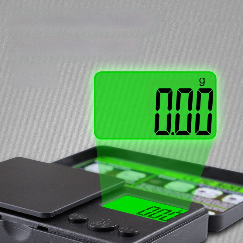 CHANGXIE CX-555 kišeninės svarstyklės su žaliu apšviestu ekranu, 1000 g talpa, 0,01 ct tikslumas.
