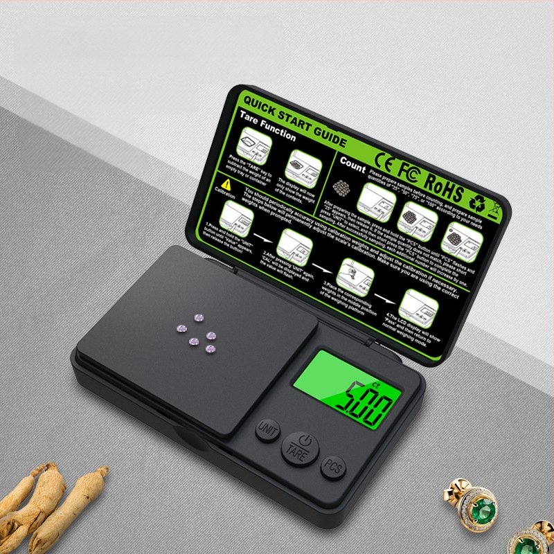 CHANGXIE CX-555 kišeninės svarstyklės su žaliu apšviestu ekranu, 1000 g talpa, 0,01 ct tikslumas.