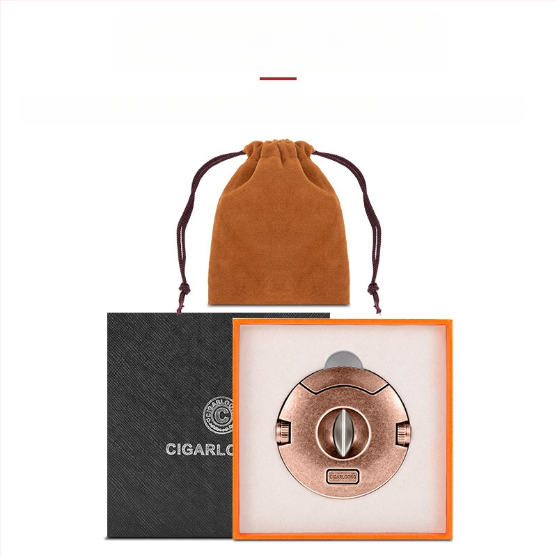 Cigāru šķēres ar V-veida nerūsējošā tērauda asmeni un slēgtu divu diametru urbjamo asmeni – roku darbs, pielāgojamas